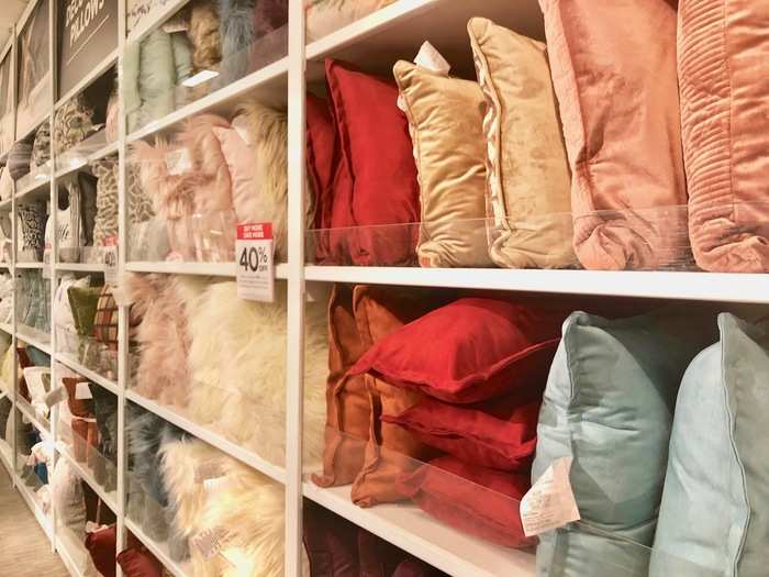 ... and this wall of decorative pillows that caught our eyes with its bright hues and fluffy textures.