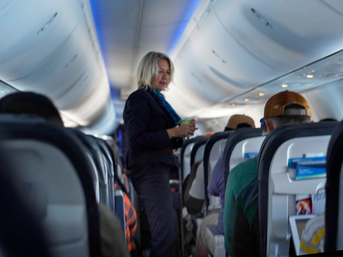 Not too long after taking off, flight attendants came around with food and beverage carts.