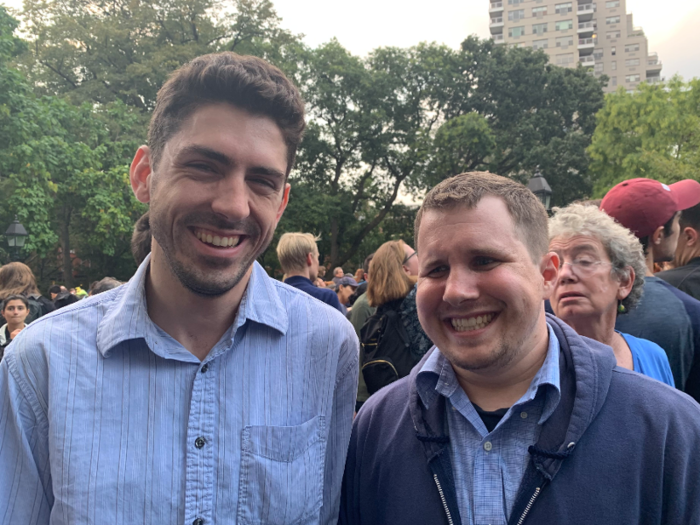 Data analyst Sean Marrin, left, and law clerk Chris Sheppard came to the Warren rally together. Both supported Warren