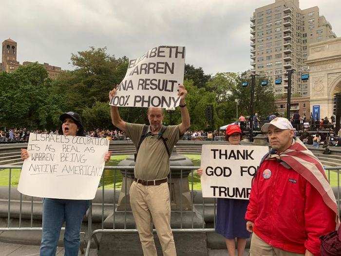 There were also less than a handful of Trump supporters holding their own counter-rally. They held signs praising the president and criticizing Warren for a genetic test she took last year proving she had a small but detectable amount of Native American DNA. It remains a conservative line of attack.