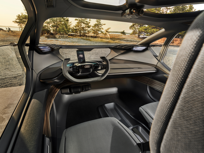 A smartphone on the steering column serves as the display center screen for the quattro’s functions, such as control and navigation.