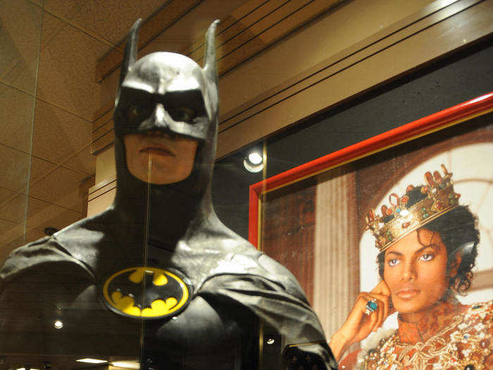 ... and life-sized figures of fictional crime-fighters like Batman ...