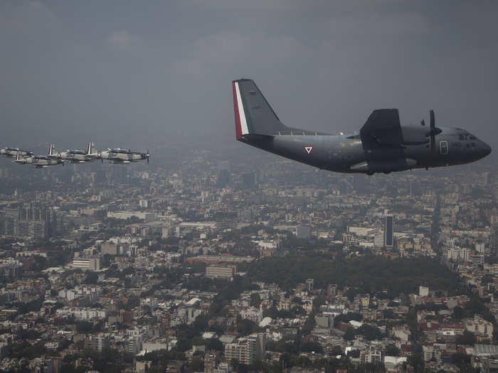 Pilot Miriam Martinez Magaña flew a T-6C Texan turboprop aircraft during the celebration, becoming the first woman aircraft commander in a military parade.