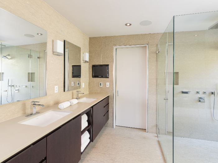 ... and opens up to a master bath with a sizable shower.