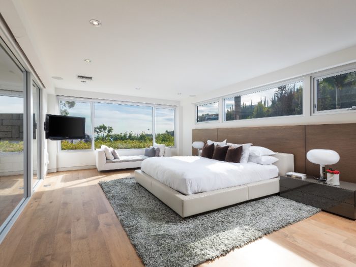 The master bedroom also gets plenty of natural light ...