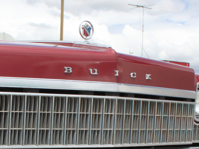 The 1975 Buick Electra, pictured below, had the crest enclosed in a metal circle.