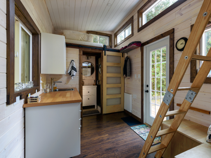 And Teri Page of Homestead Honey says she built her 348-square-foot tiny house for $8,270, although her neighbor