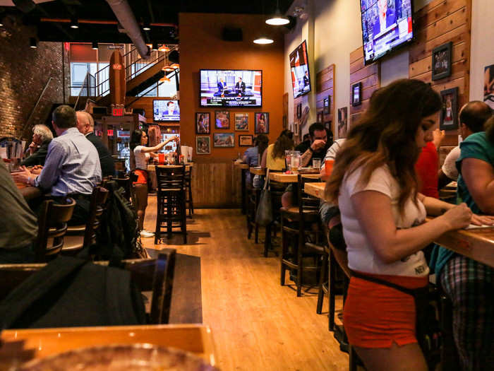 I waited around 40 minutes for my wings to arrive, which was the lowlight of my visit. I watched as waitresses in orange booty shorts and white tees or tanks zoomed by me with trays of wings balanced on their palms. Always the bridesmaid, never the person eating the wings.