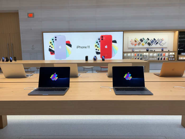 Some elements of the store remain the same — long wooden tables with the current lineup of iPhones, laptops, and Apple Watches are available to play with.