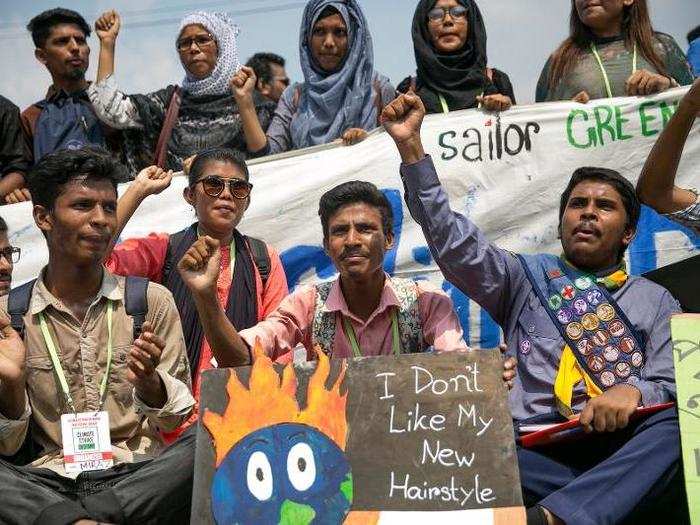 Adults also took part in the protest. Here, people in Dhaka, Bangladesh, demand action.