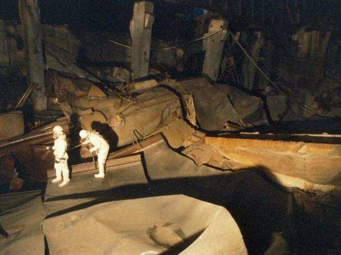 Less than two months after the disaster, Soviet cleanup workers scrambled to build a "sarcophagus," or massive covering, to contain the debris.