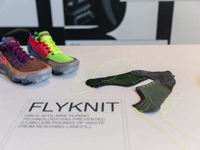 At the event, Nike had a display breaking down the components of its FlyKnit shoe, constructed using circular design.