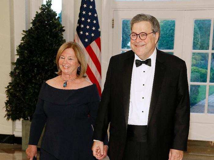 US Attorney General William Barr and his wife Christine smiled for the cameras.