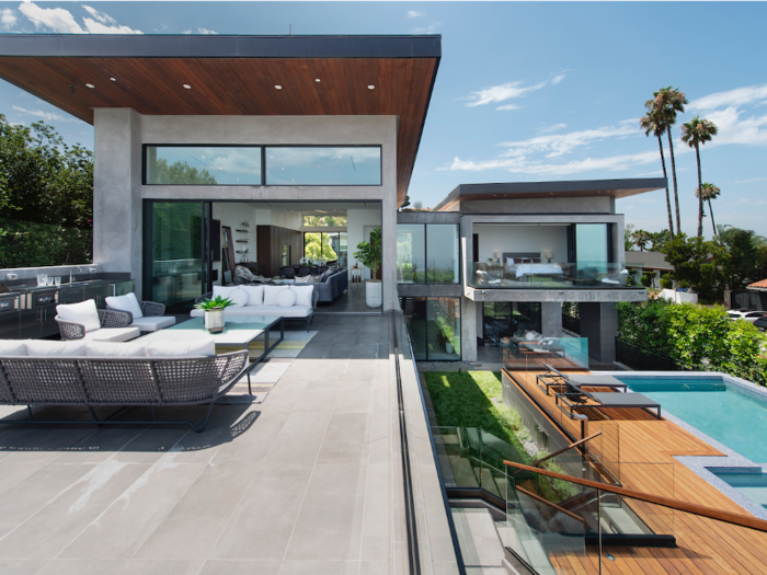 Along with views of the mountains and the city, the deck and pool are also visible from the terrace.