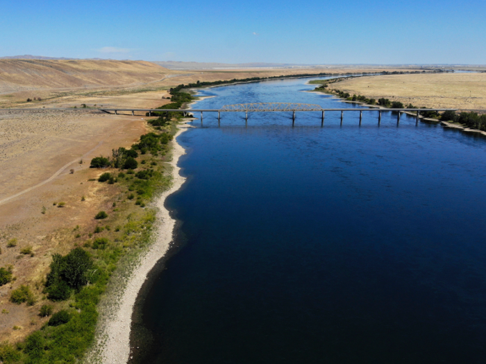 The Columbia River passes Hanford to the north and the east by a few miles, and it