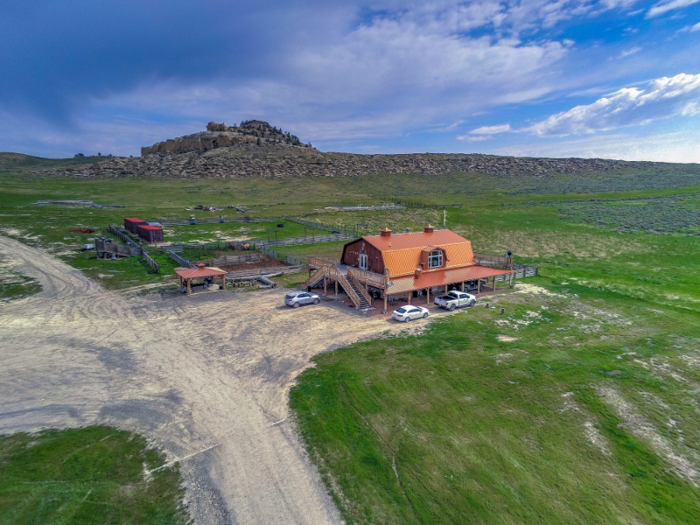 The ranch features a restaurant and saloon, horse barns, and a state-of-the-art shooting range.