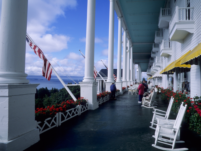 One example of a Victorian-style building is The Grand Hotel, built in 1887 and known for having "the world’s longest porch with views of the Straits of Mackinac."