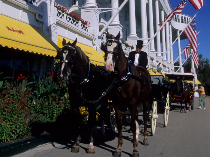 The island brings in about 500 horses each spring for the peak summer tourist season, allowing visitors the ability to easily travel by carriage.