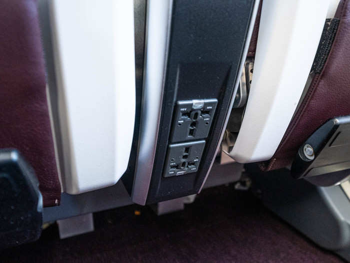 Each seat also has a universal power outlet.