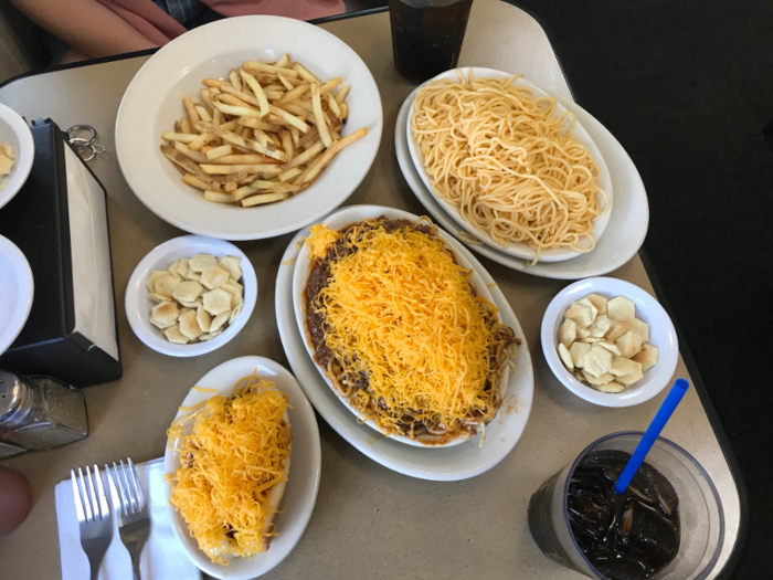 In true local fashion, my friend and I ordered a cheese coney, a regular three-way, spaghetti, and fries.