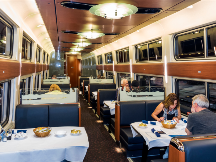 This 2017 photo shows a couple eating in the dining car on another Silver Service train between New York and Miami.