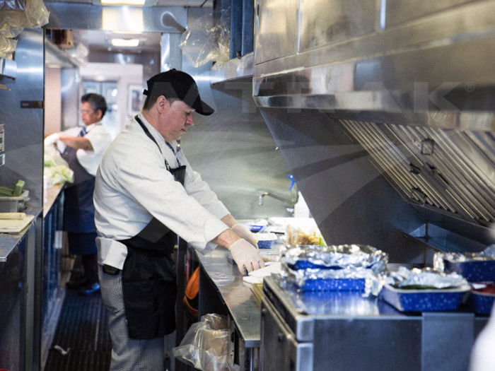 This 2015 photo shows a kitchen that will serve about 300 meals by the time the train reaches New York.