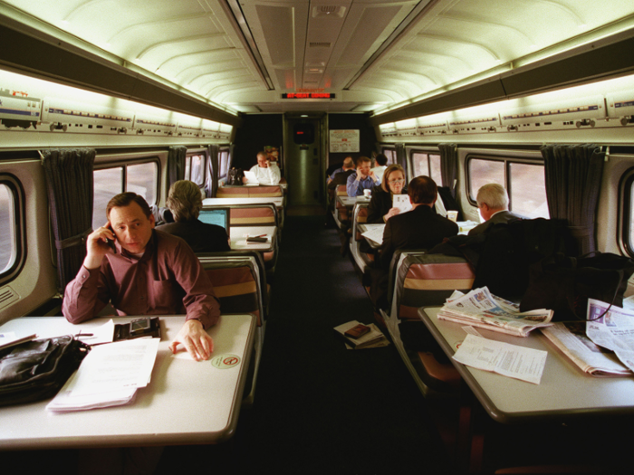 Passengers worked and ate in this 2000 photo of the Amtrak Metroliner.