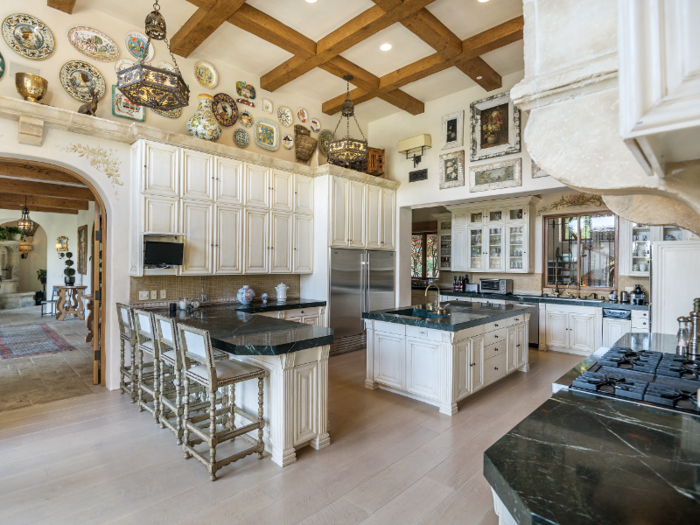 The center hall in the main house connects to the living room, the dining room, and the kitchen (pictured below).