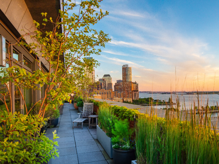 The standout feature of the 4,000-square-foot apartment is its 10-foot-wide, fully landscaped wraparound terrace, which offers views of the Hudson River, the Empire State Building, and One World Trade Center.