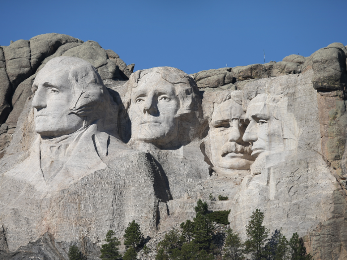 Just 17 miles away are the presidential profiles of George Washington, Thomas Jefferson, Theodore Roosevelt, and Abraham Lincoln carved into Mt. Rushmore.