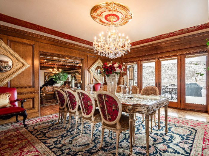 Along with a formal dining room, other amenities in the estate include a basement with a billiards table, a wine cellar, a bar imported from Scotland, and a sauna.