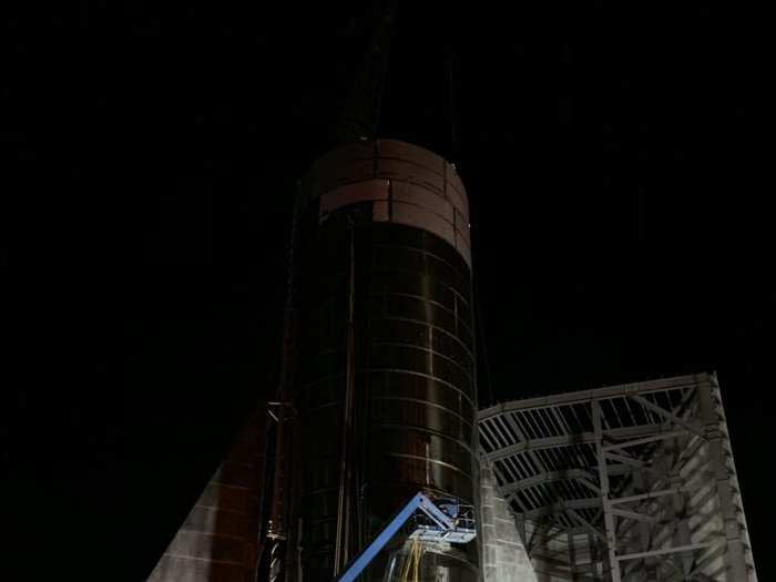 Workers have been working into the night to prepare Starship Mk 1 for Musk