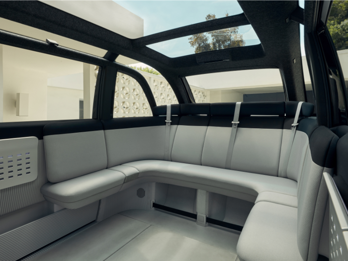 The company describes the car as an “urban loft on wheels” with seats that look more like furniture, like a sofa, than traditional car seats.