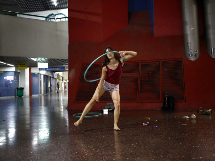 Stav Pinto is a circus artist who practices her acrobatics in the station. Pinto uses her circus talents to teach life skills to children with disabilities and meets with an informal circus group on Monday evenings.