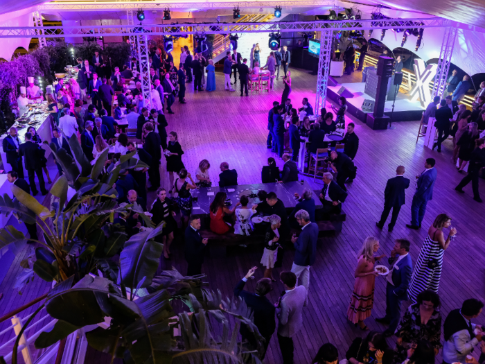 There were no free tables on the main floor, so I ate standing up at a table on the upstairs deck overlooking the party.