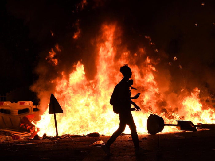 Fires and smoke billowed across Hong Kong, and the protests continued on into the night.