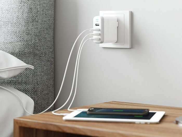 A universal USB wall charger that fits four devices