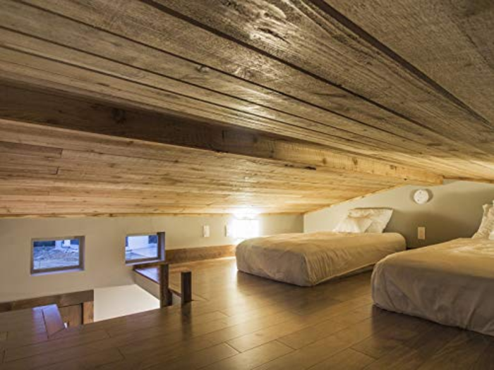 The slanted roof makes hitting your head a strong possibility, and standing up in a lofted bedroom like this is entirely out of the question.