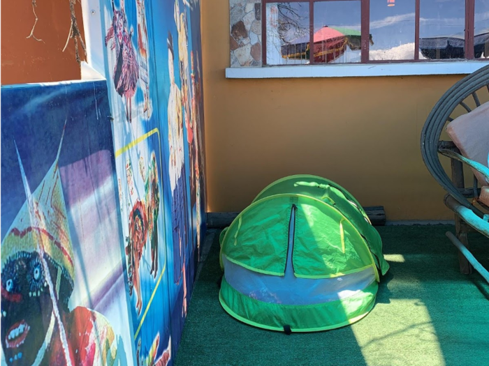 In transit between Copacabana, considered the cradle of Andean civilization, and La Paz, Bolivia, I worked over a meal while baby slept peacefully in this toddler travel tent.