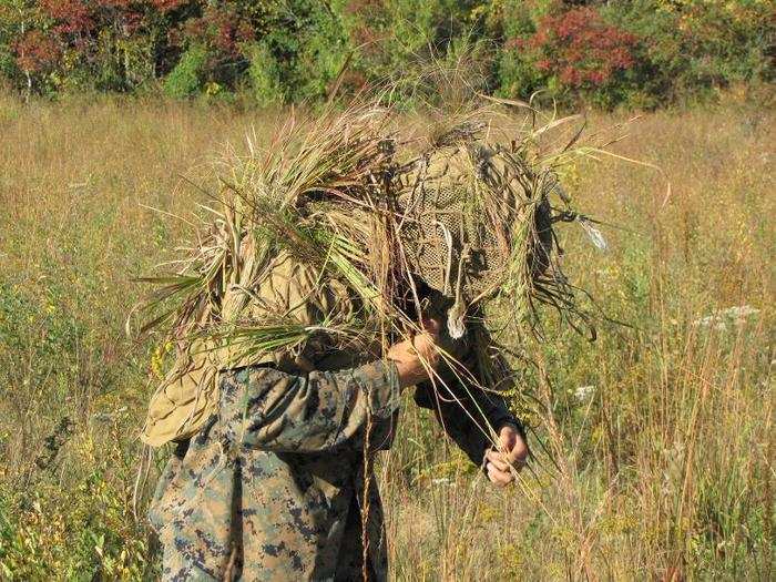 The snipers do not want to be seen as the bush. They want to be the space between the bushes.