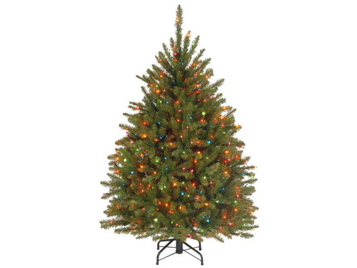 A short pre-lit fir Christmas tree with 450 multicolor lights