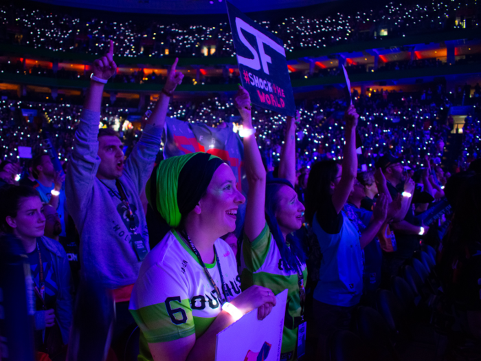 Throughout the performance, bracelets given to attendees lit up in sequence, creating a stunning effect throughout the crowd. The bracelets would be used through the competition, as well.