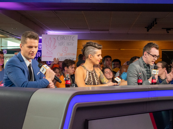 Fans could also get close to the broadcast team, who were filming live from the concourse. Spectators in the front rows held up signs to get them on the air.