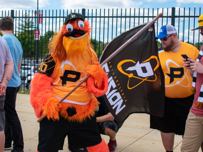 A fan dressed as Gritty and flying a Philadelphia Fusion flag was one of the highlights of the wait posing for quite a few pictures.