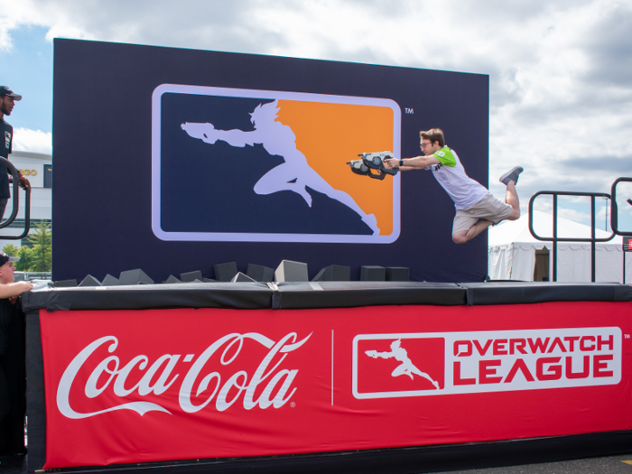 There were tons of interactive activities for fans, such as getting their picture diving across the Overwatch logo into a foam pit.