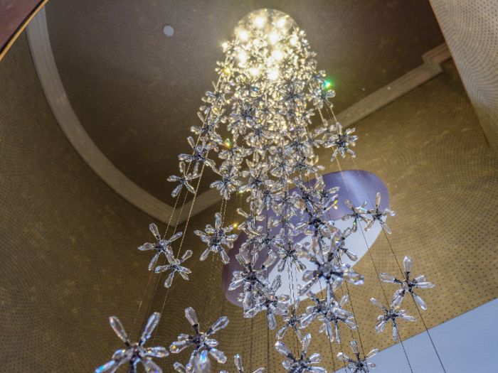 The first thing I noticed was an over-the-top, two-story "cascading crystal" chandelier just inside the entryway.