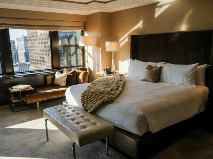 The master bedroom suite includes a king bed with luxury imported linens and a pillow menu.