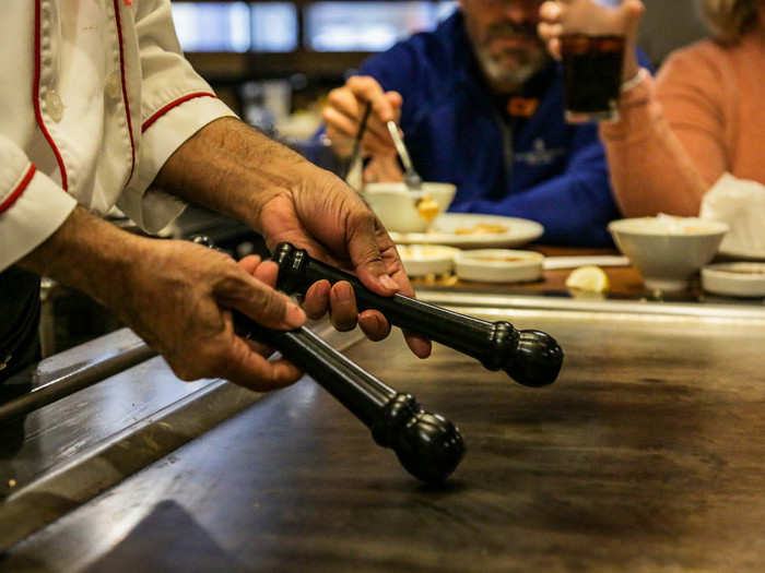 He ended the meal by banging and flipping two sticks on the teppanyaki grill. I