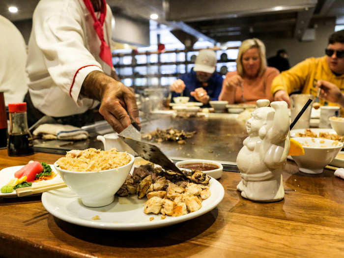 Chef Haque dished out the chicken and the mushrooms, which had also been hanging out on the grill top for a while.