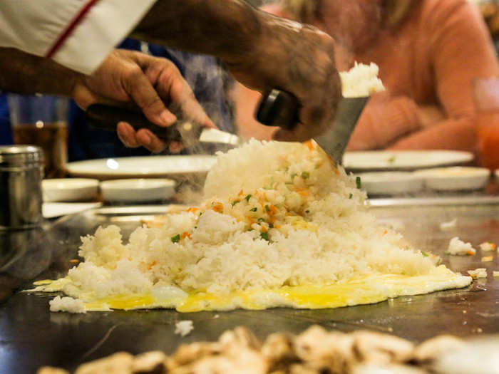 He piled the rice and pre-cut veggies on top of the still-cooking egg. At this point, I was concerned by the rice-to-not-rice ratio, which was slightly higher than I would have liked.